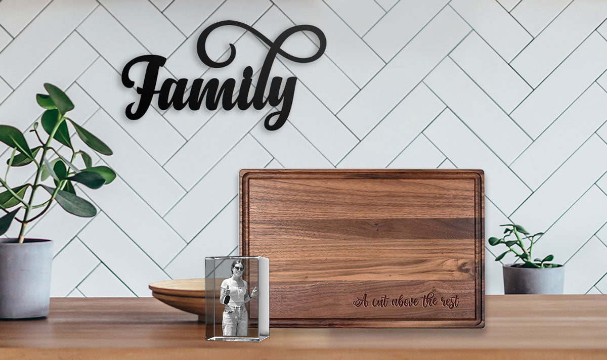 Family sign, engraved cutting board, and personalized 3D crystal photo decoration in home kitchen